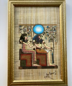 Framed Egyptian papyrus painting of Goddess Isis nursing Horus the Child, hand-painted with intricate detail and authentic symbolism.