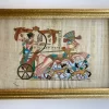 Framed Egyptian papyrus painting of King Tutankhamun riding a chariot, hand-painted on authentic papyrus by Egyptian Art Caravan