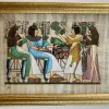 Hand-painted papyrus painting of an ancient Egyptian wedding party with musicians and dancers, framed and created by Egyptian Art Caravan