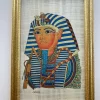 Framed hand-painted papyrus of King Tutankhamun’s golden burial mask on authentic Egyptian papyrus.